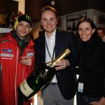 At Madonna di Campiglio just Ferrari bubbles and Surgiva water are used for the toasts with Fernando Alonso and Valentino Rossi