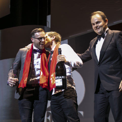 Chef Rasmus Kofoed and Søren Ledet on stage with Matteo Lunelli