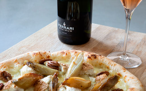 Ferrari Maximum Rosé and Focaccia with mozzarella, grilled shallots, smoked ricotta cheese, and walnuts