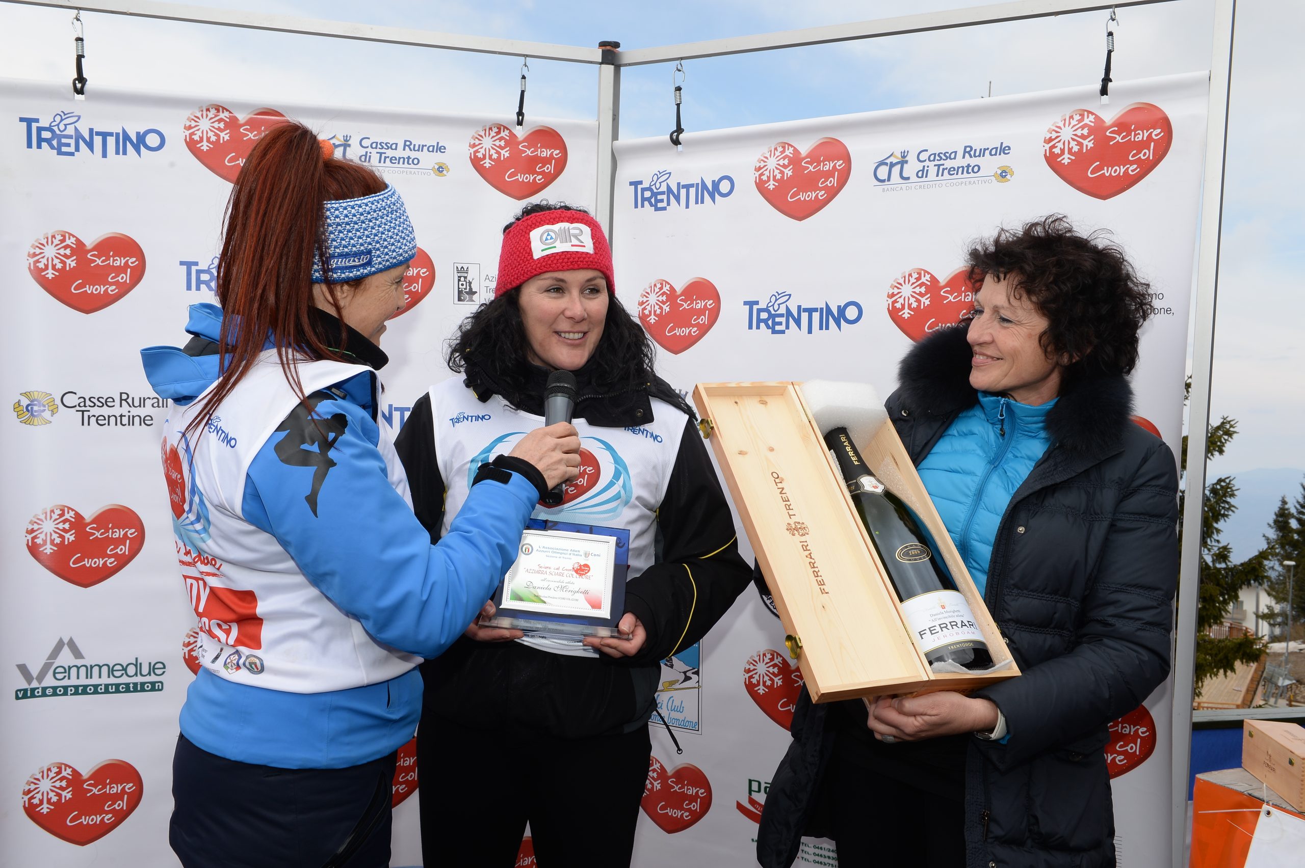 Parata di grandi campioni e di Ferrari per “Sciare col Cuore” sul Bondone